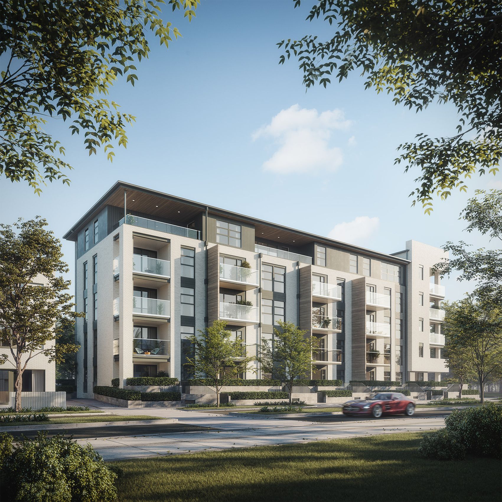 Contemporary residential building framed by trees